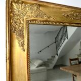 Antique gilded mirror from the Restoration period, 19th century.