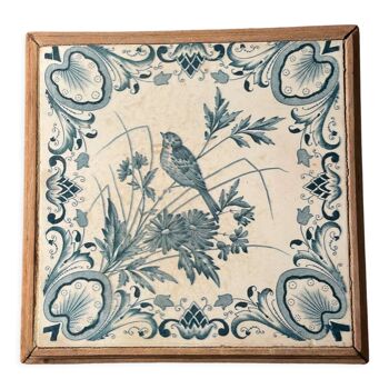 Dessus de plat en terre de fer motif oiseau