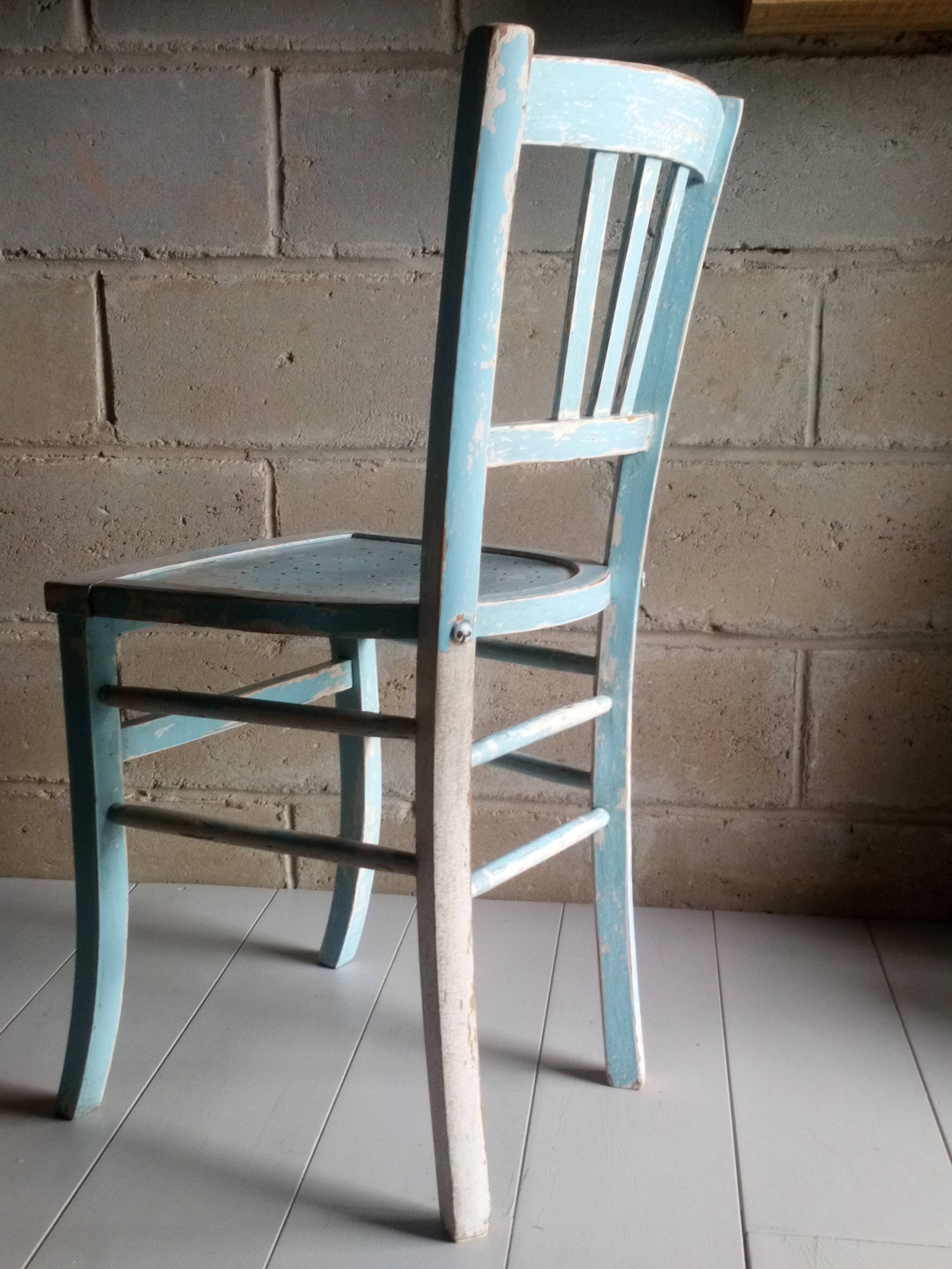 Blue and white patinated old bistro chair