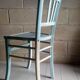 Blue and white patinated old bistro chair