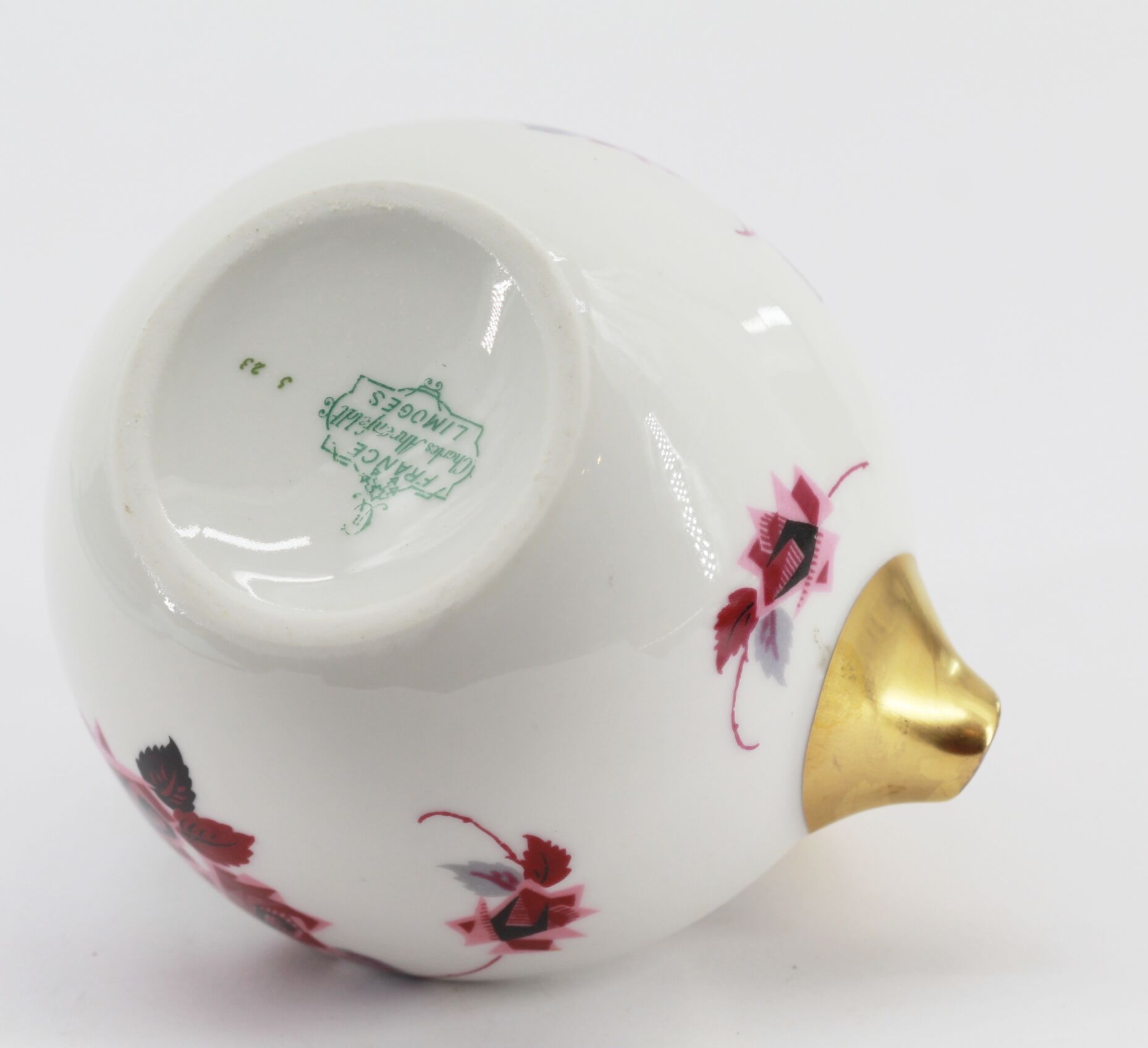 Antique porcelain teapot pourer