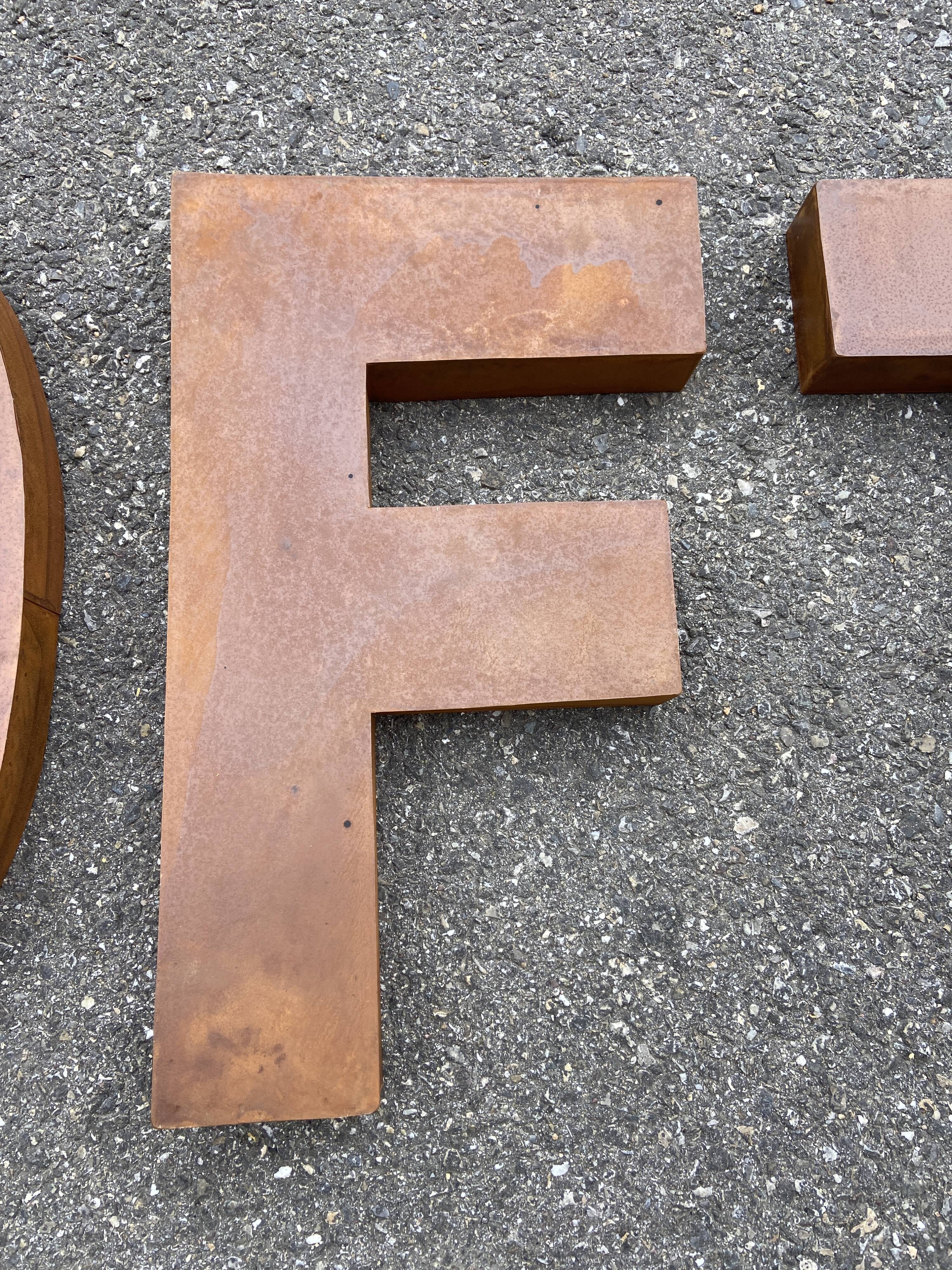 LOFT sign in vintage metal letters