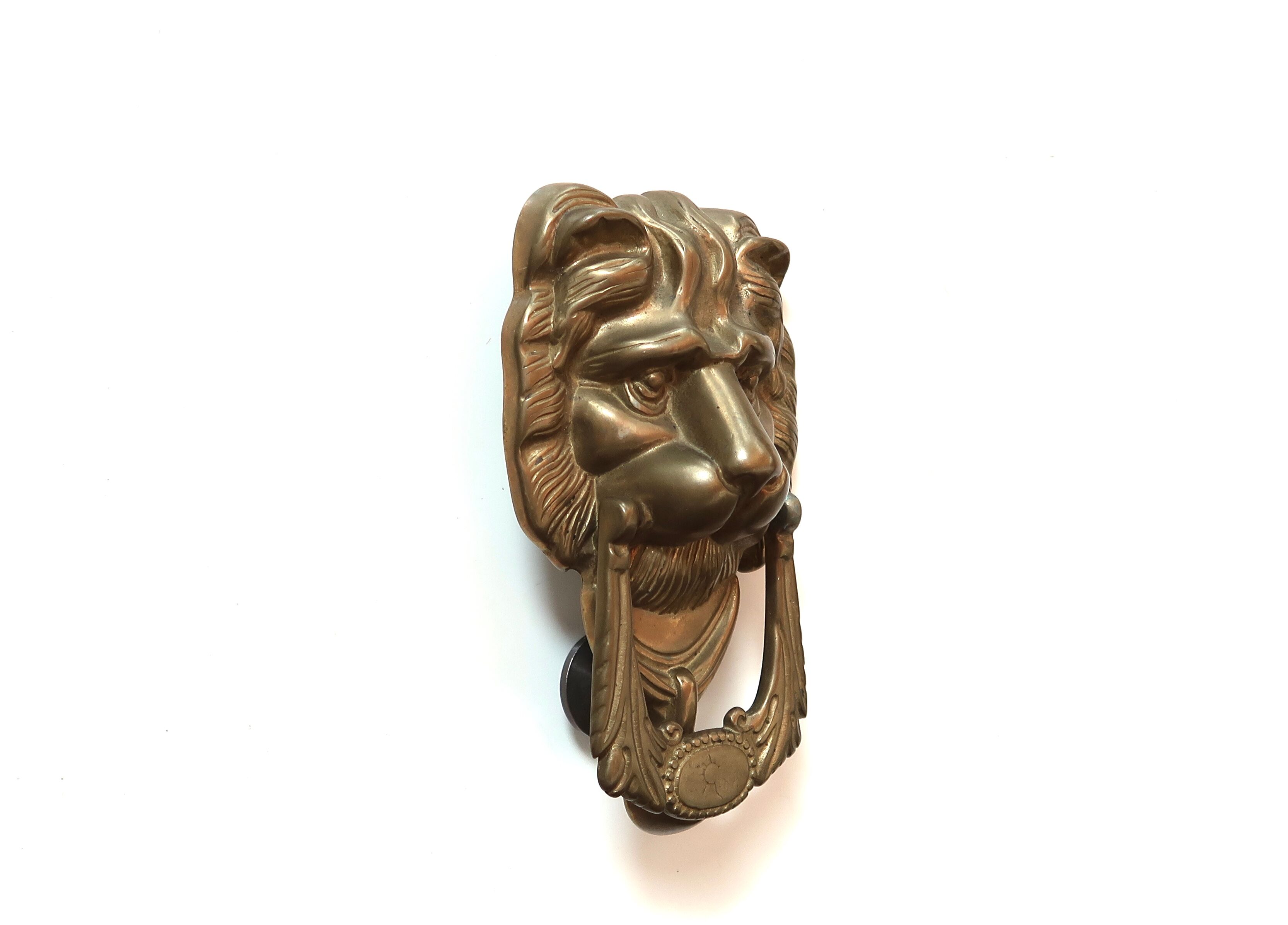 Lion-shaped brass door knocker, 70s
