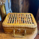 Wicker and wood suitcase