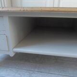 Coffee table on casters, made from an old desk, pearl gray base and belt.