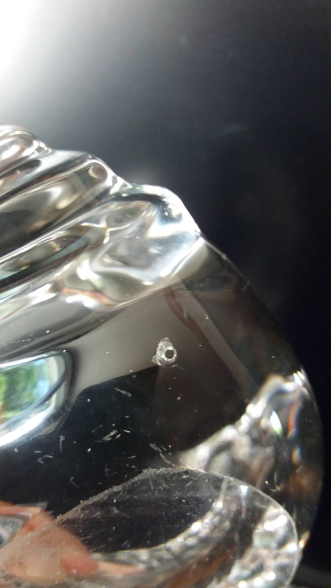 Shell-shaped crystal paperweight.