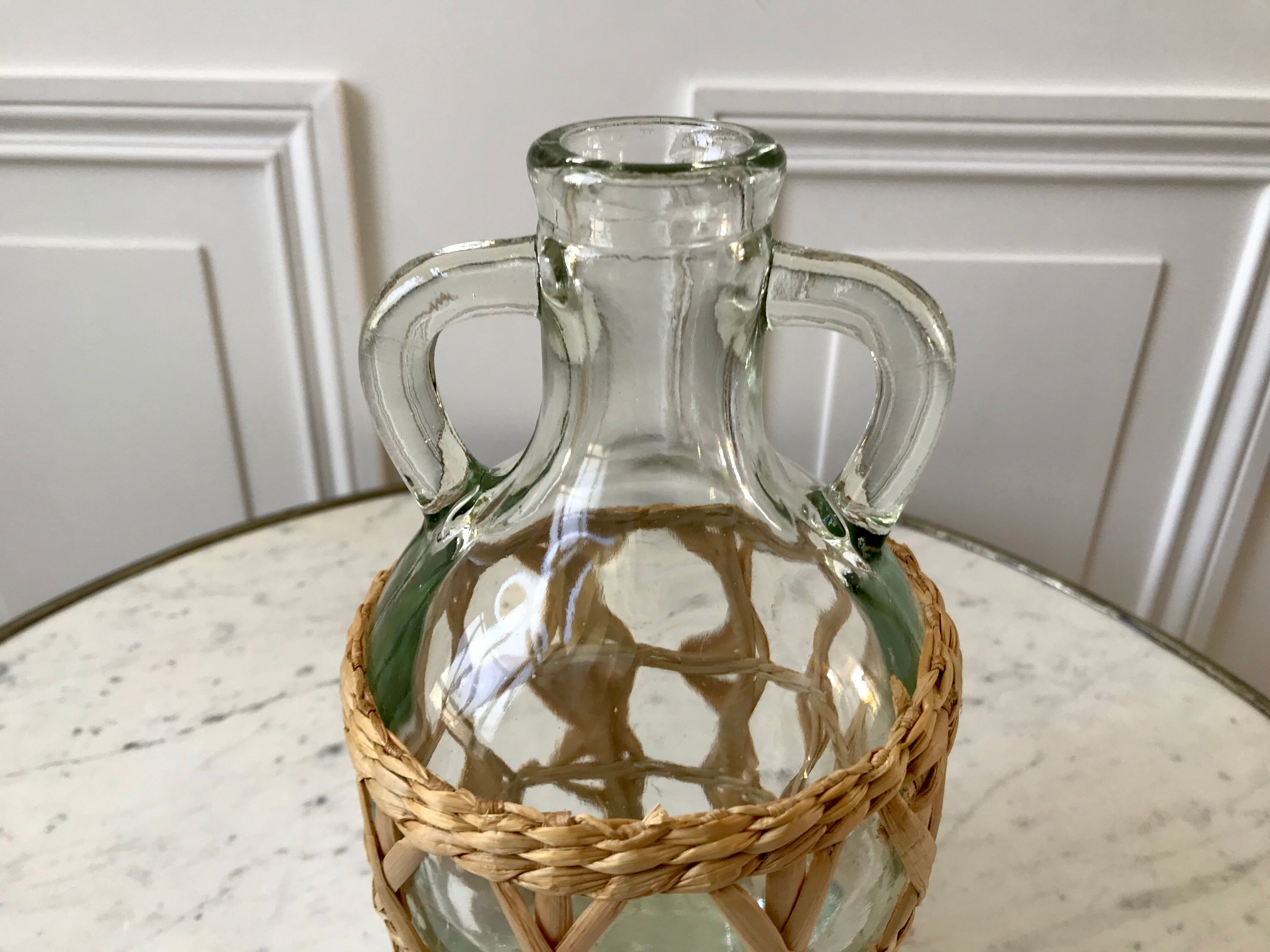 Bottle with handle and covered with wicker / rattan 70s