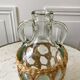 Bottle with handle and covered with wicker / rattan 70s