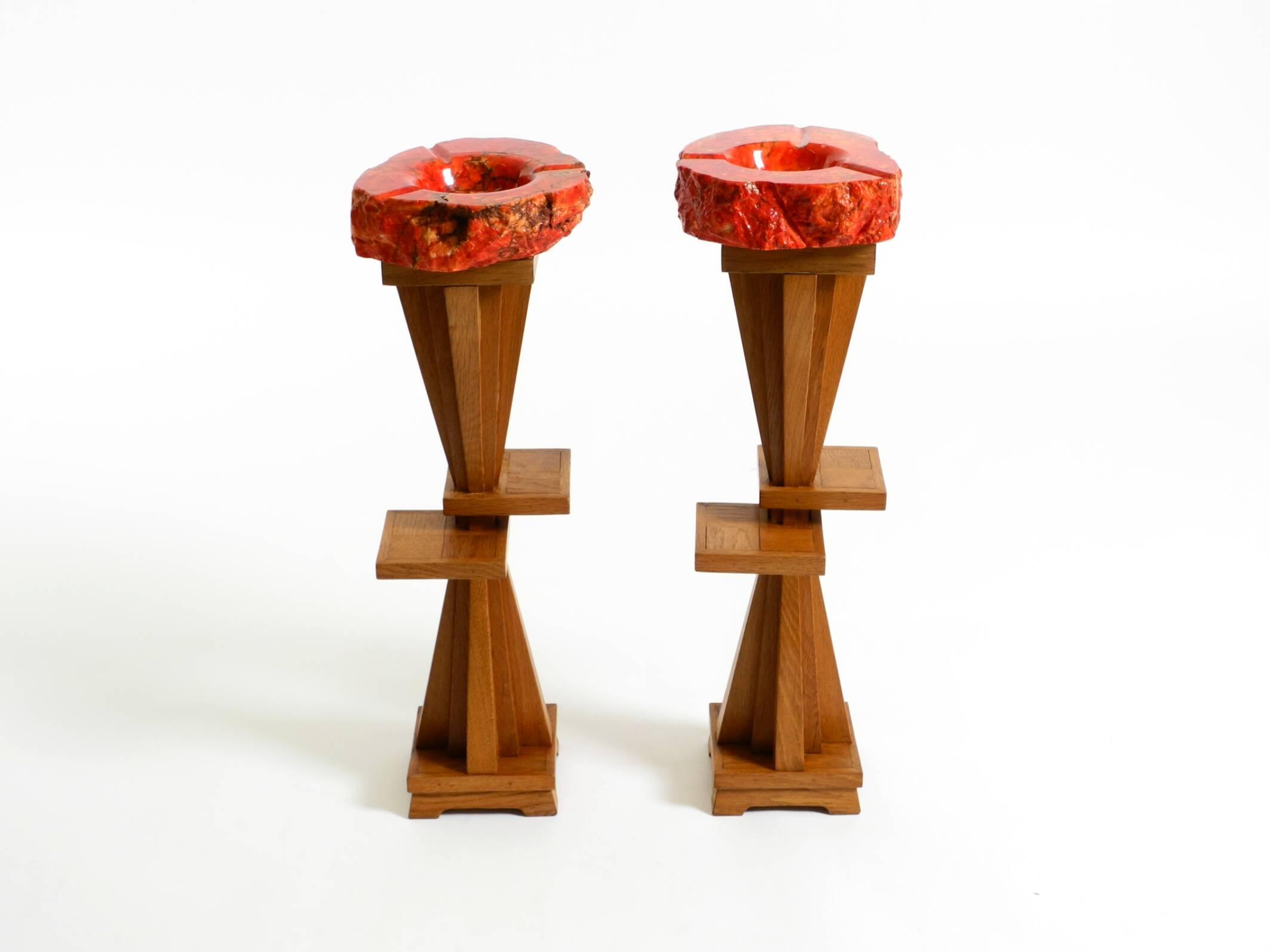 Two mid-century standing ashtrays consisting of red Alabaster cup
