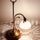 Old lamp adjustable on foot tulip golden brass.