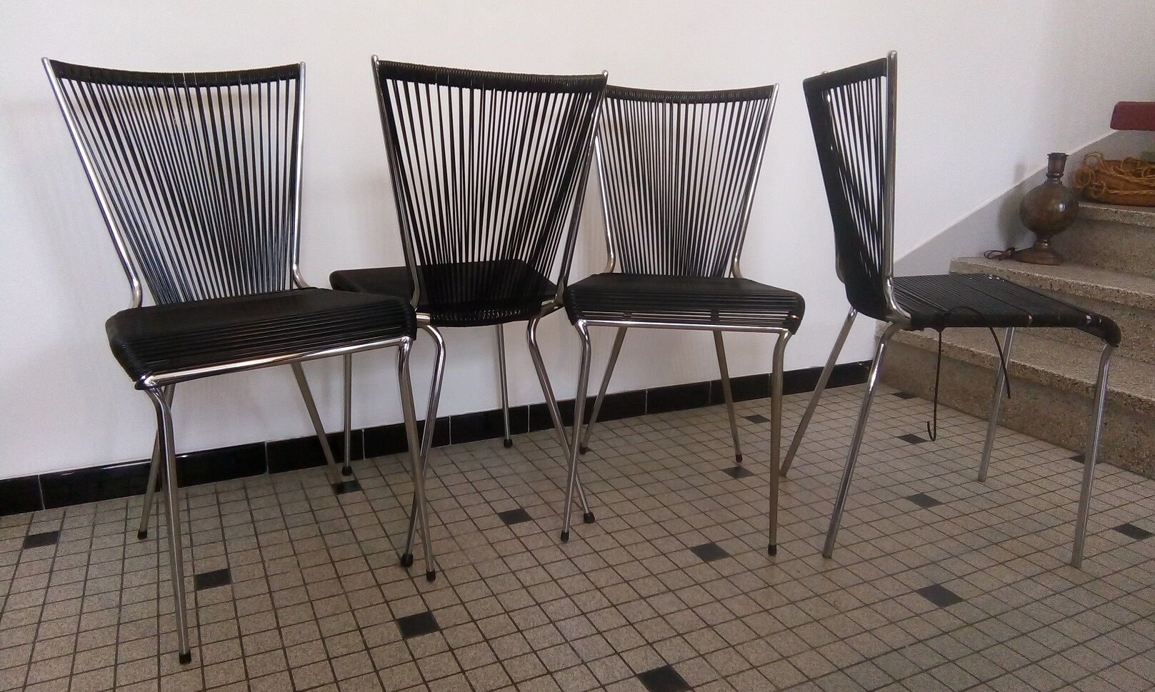 Set of black scoubidou chairs