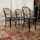 Set of 4 bentwood bistro chairs in black with caning.