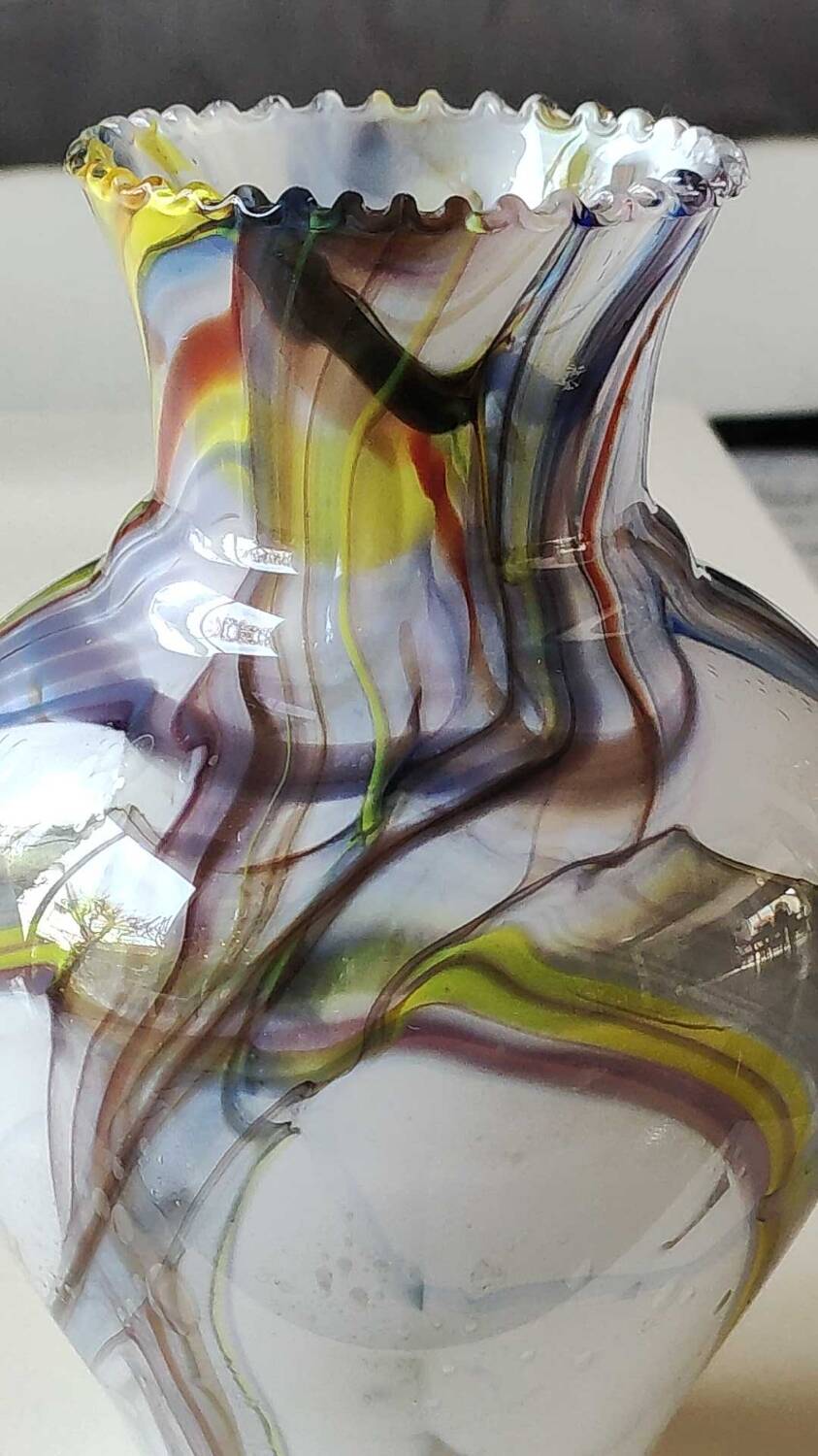 Blown Art glass ball vase from Murano/Italy. Decor swirls of smoke/polychrome waves. Dimensions 20 x 15 cm