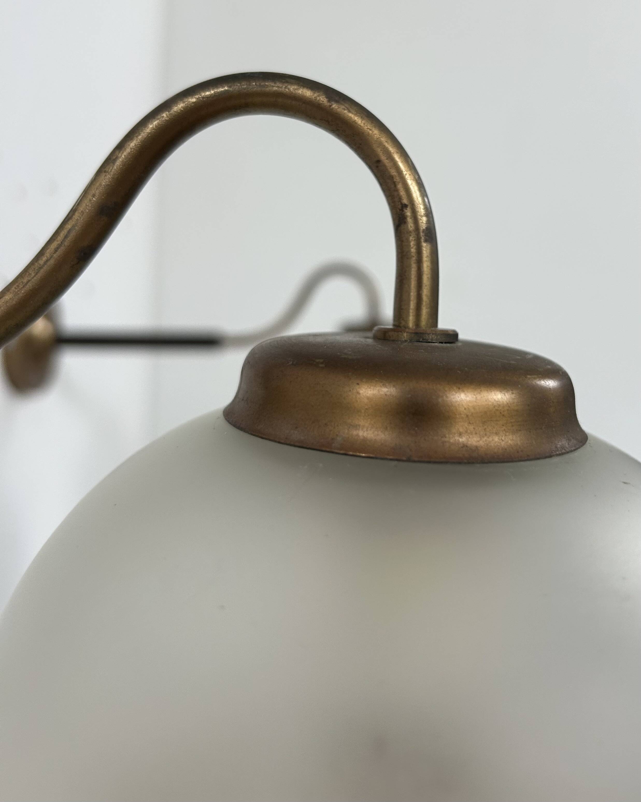 Vintage pair of wall lights, brass and frosted glass, France, 1970.