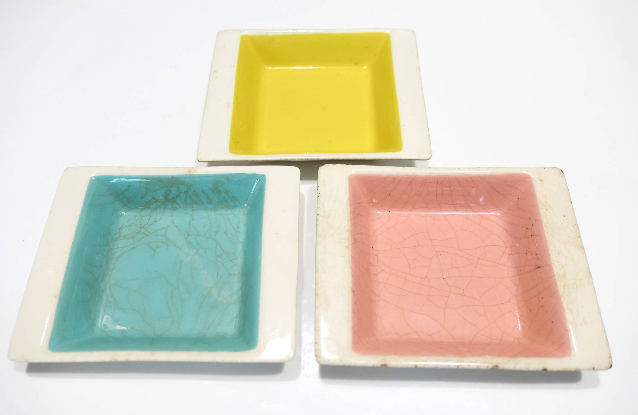 Set of three German ceramic catchalls from the 1950s.