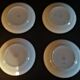 Series of four flat earthenware plates P.B. Rochechouart Limoges model Anna