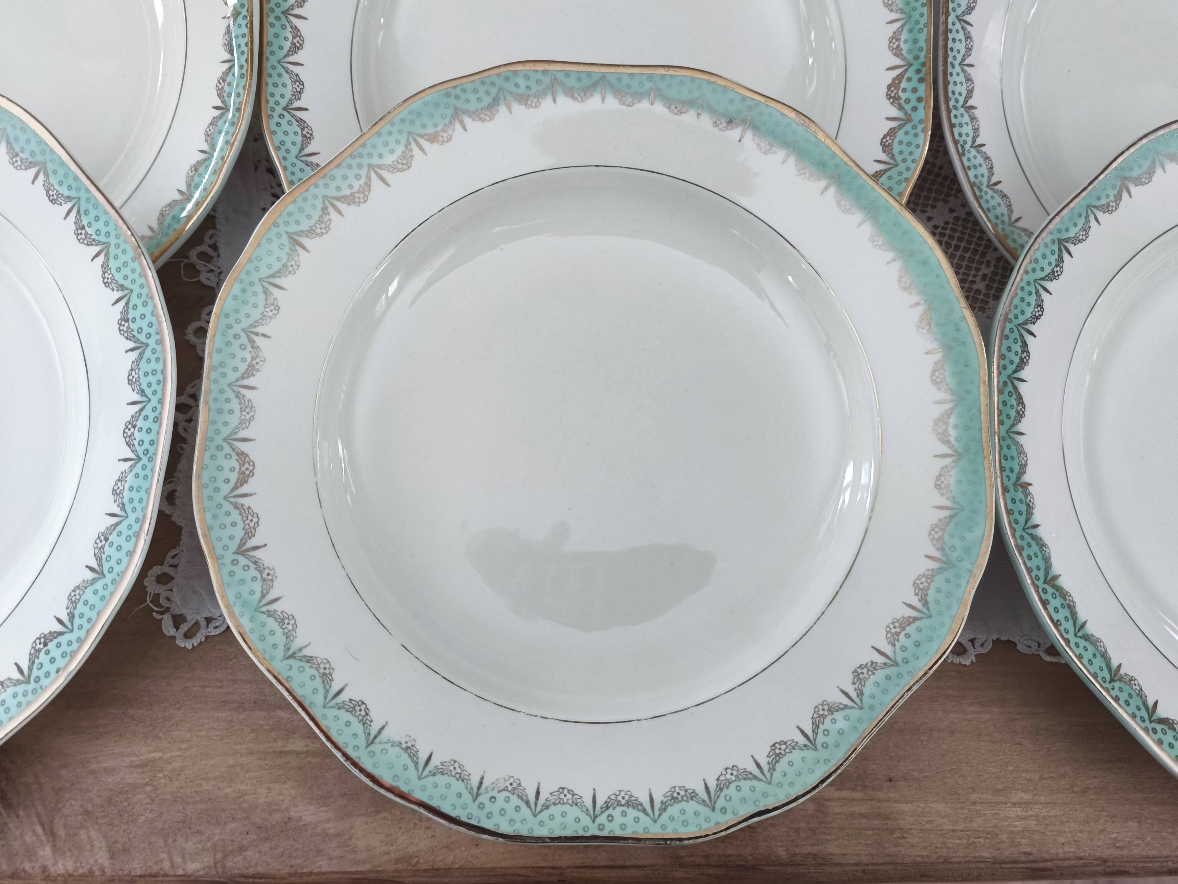 Set of 12 Longwy France earthenware soup plates, Trianon model