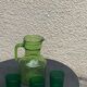 Carafe and 3 green glass glasses with vintage embossed fruit pattern