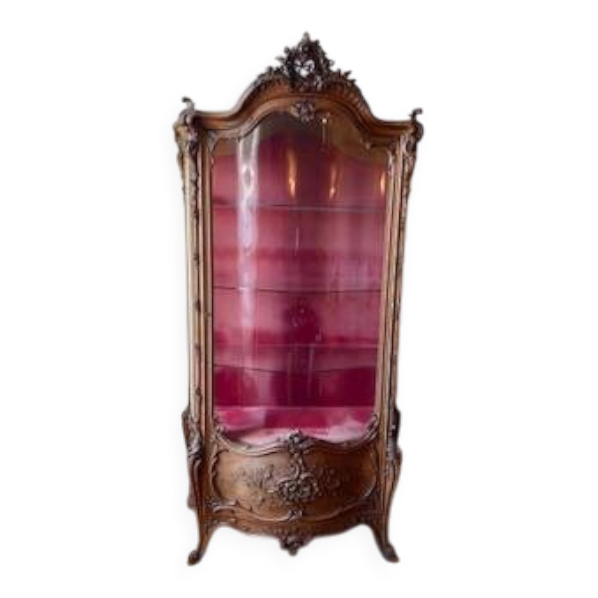 Large wooden display cabinet in Louis XV/rococo style with a strongly curved front.