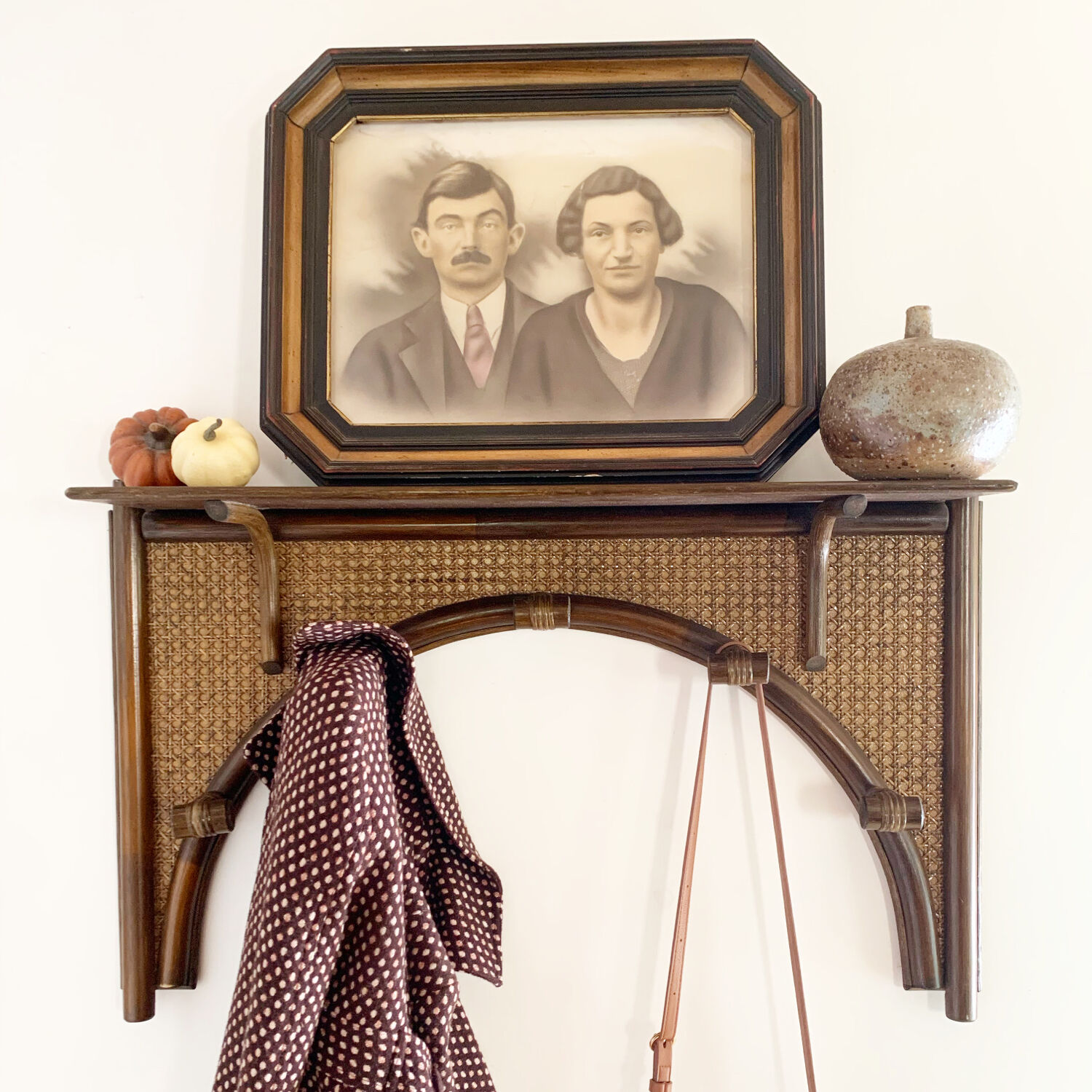 Vintage rattan and cane wall coat rack