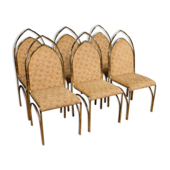 Six Italian design chairs in golden metal