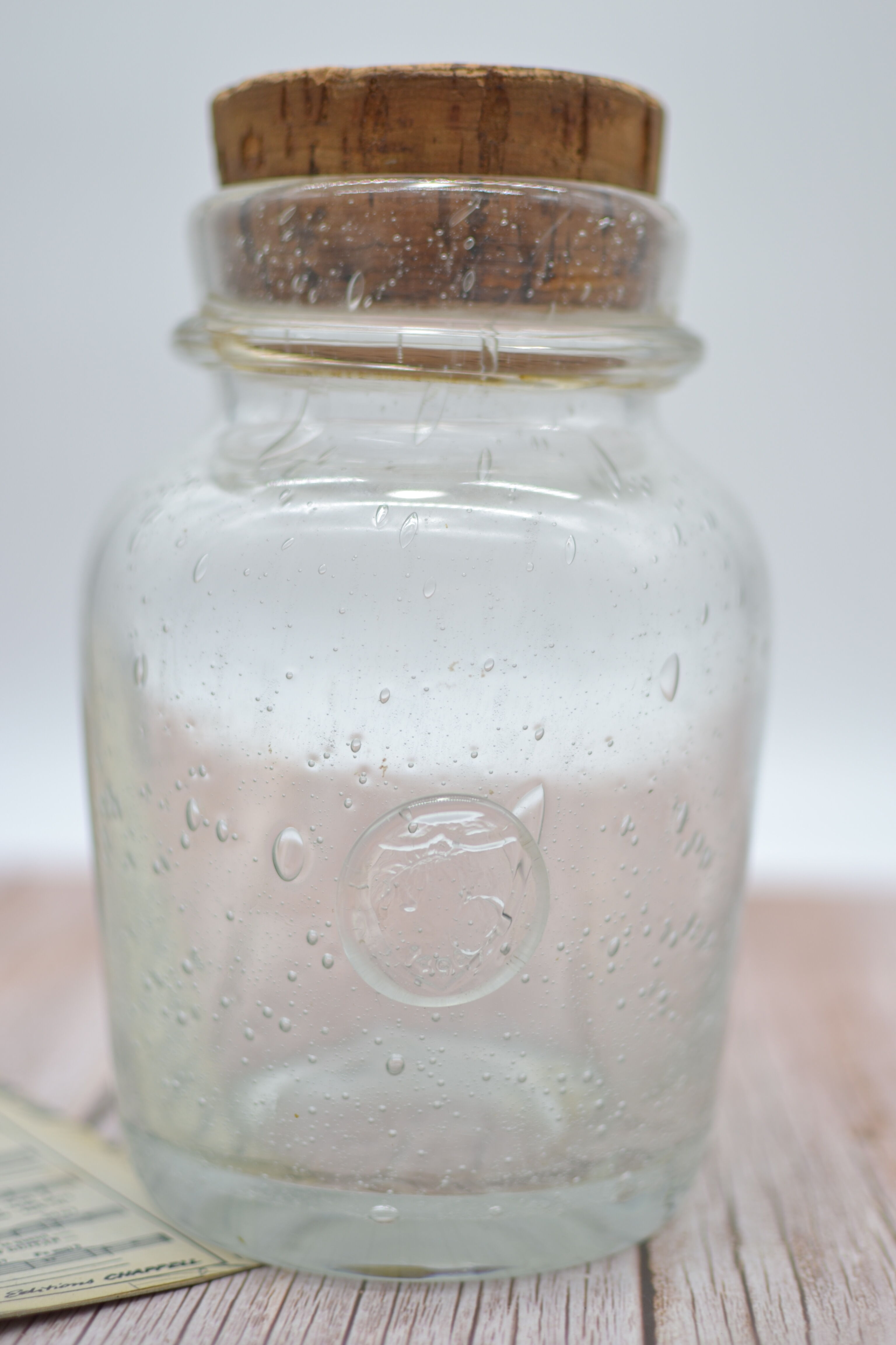 Blown glass jar with original cap