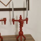 Pair of red wooden candelabra from Sweden 1970
