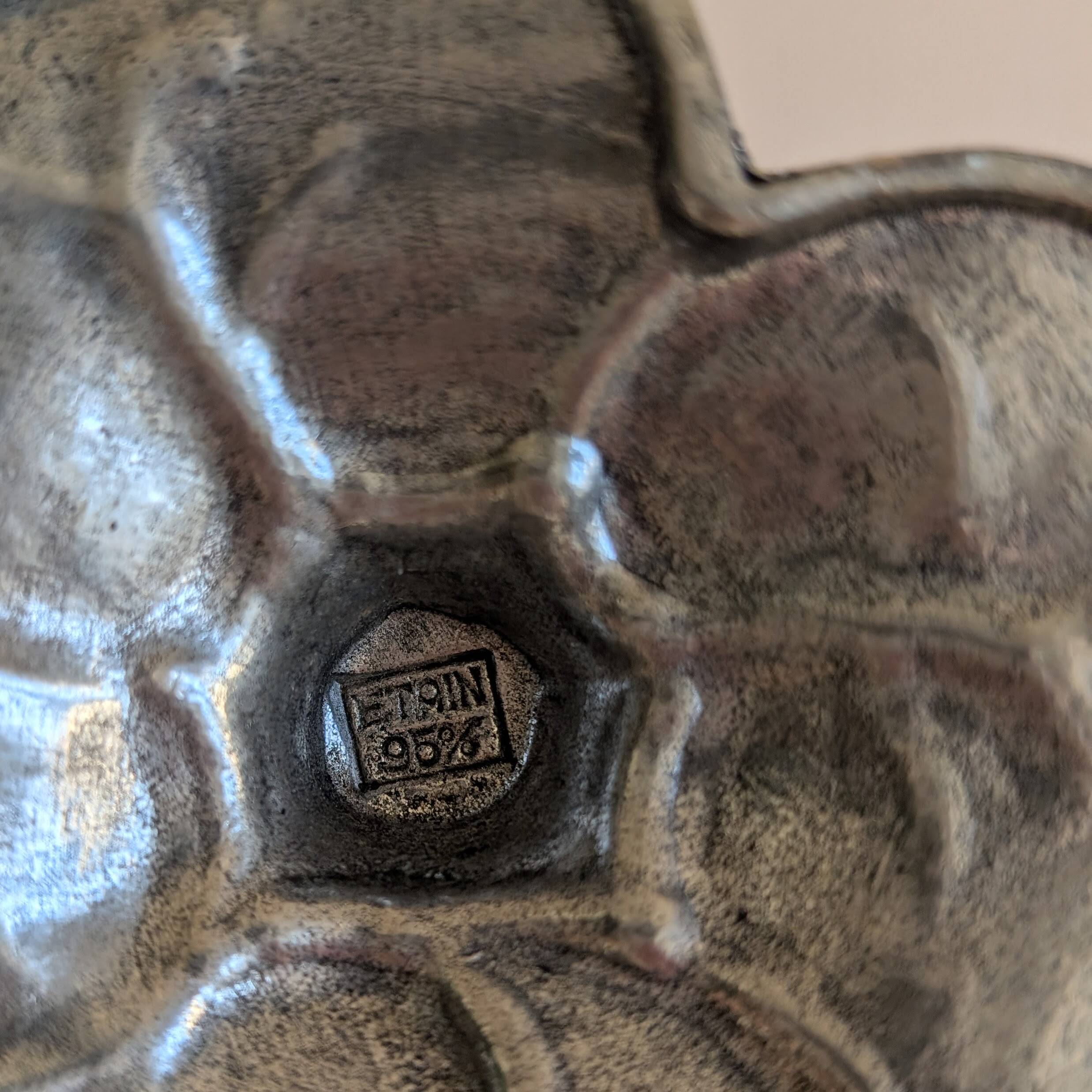 Tin candle holder