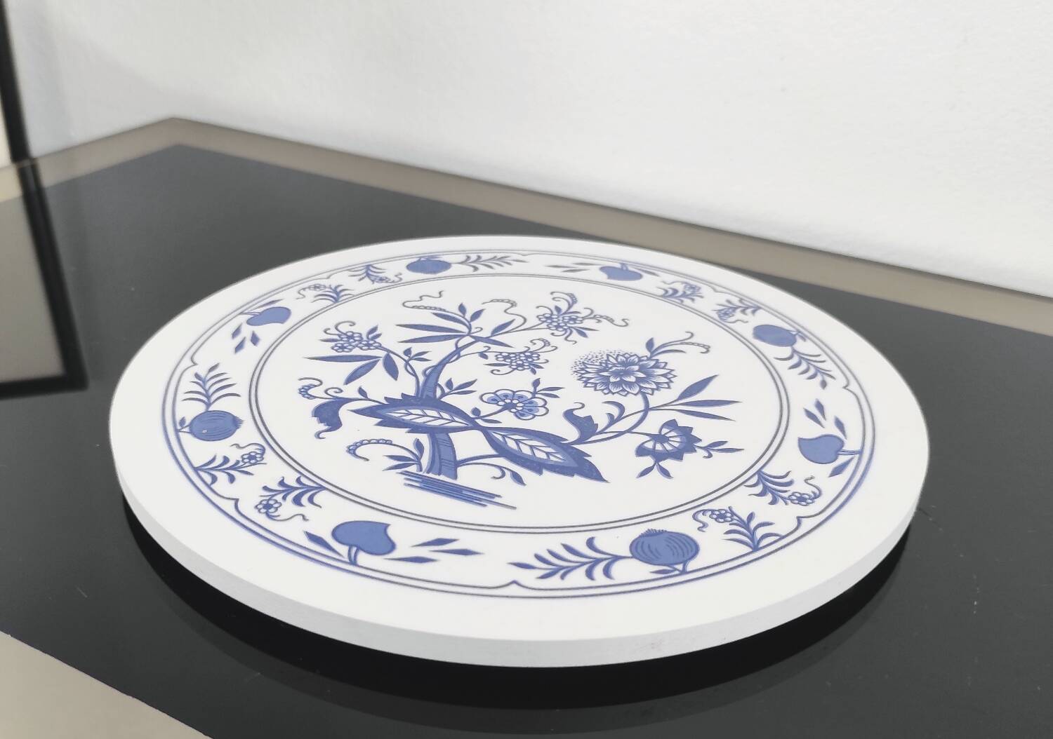 Vintage round trivet with blue floral pattern - 1970s
