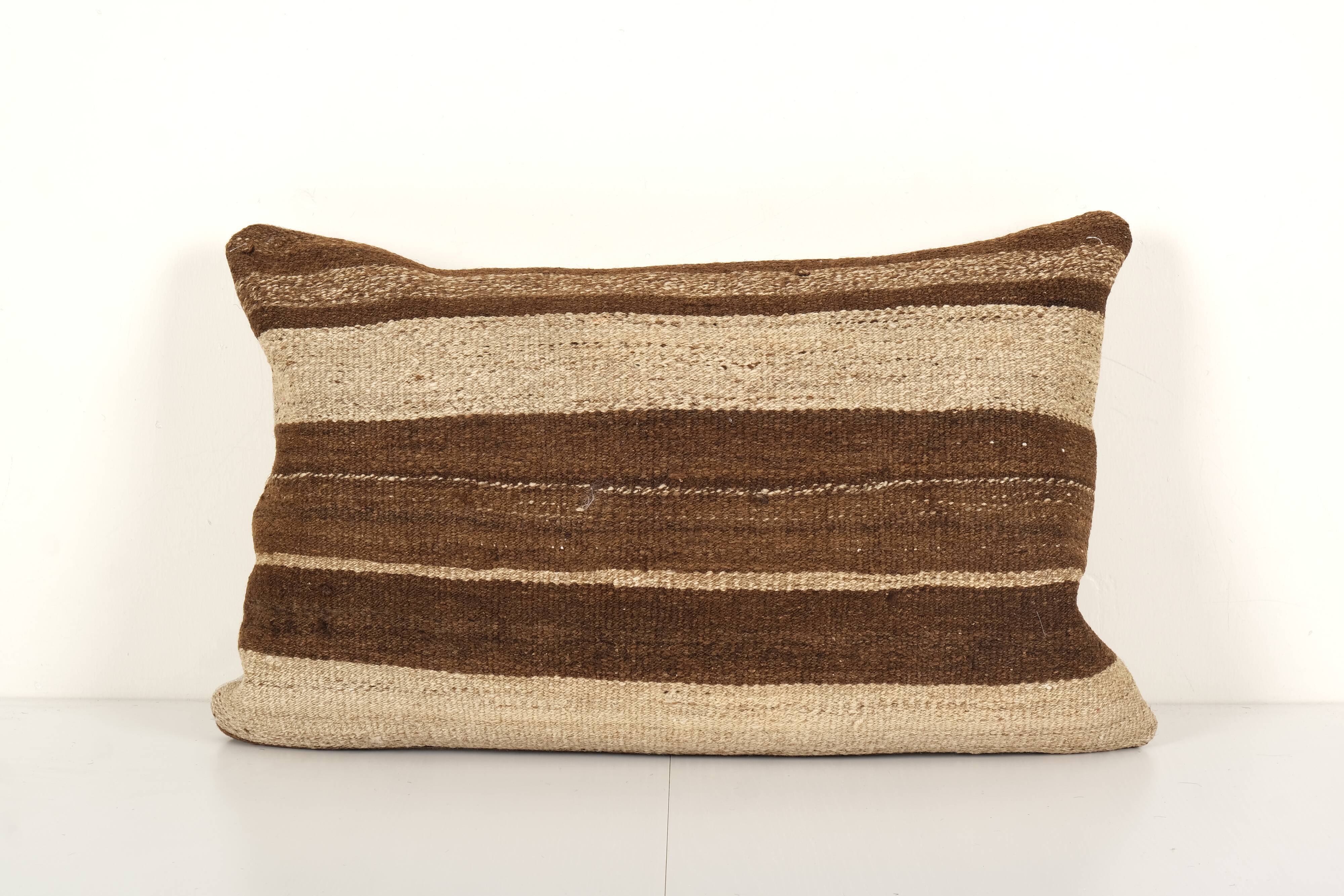 Vintage minimalist style hemp pillow with original details, organic brown wool turkish lumbar