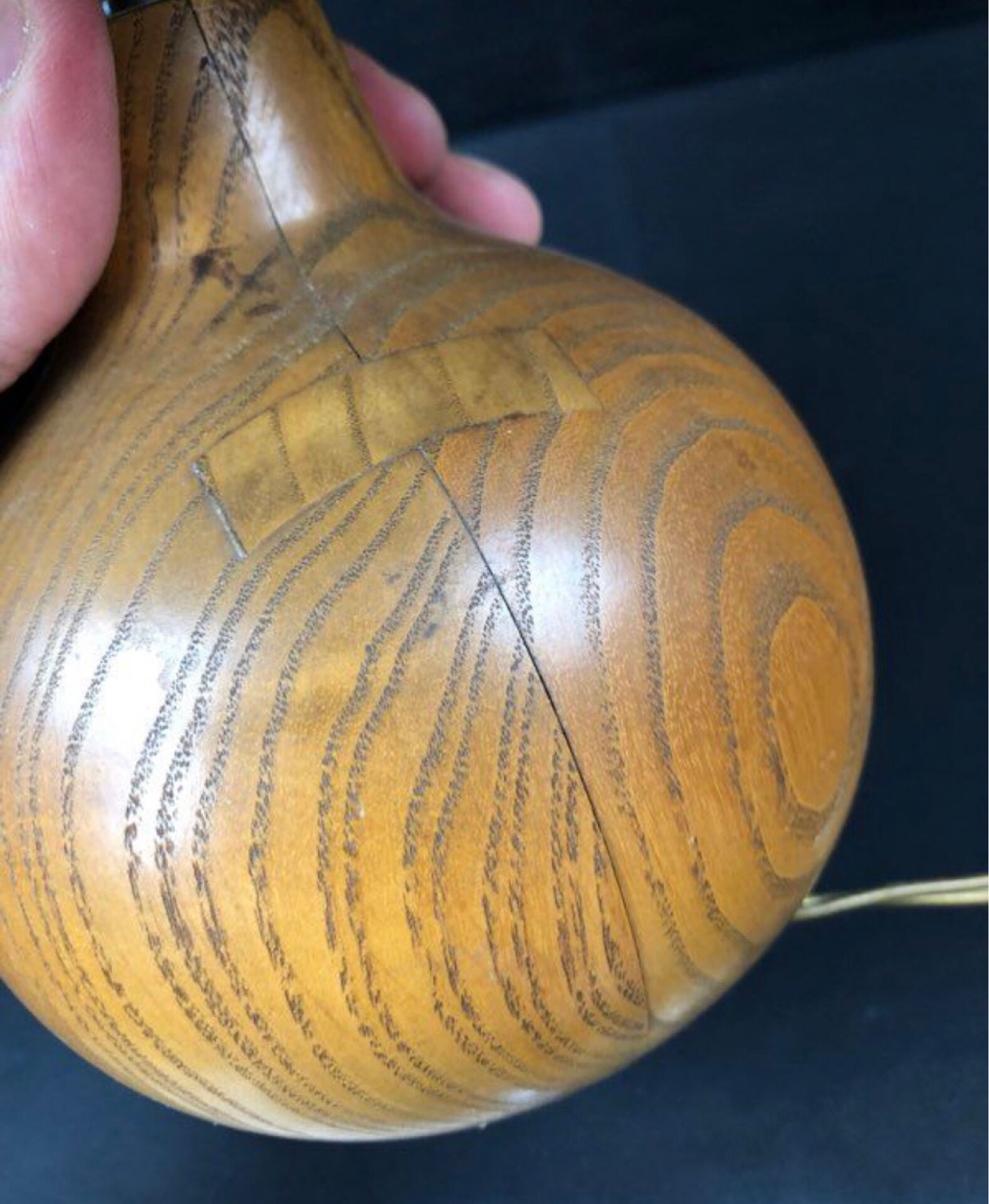 Vintage modernist lamp in wood and hammered copper.