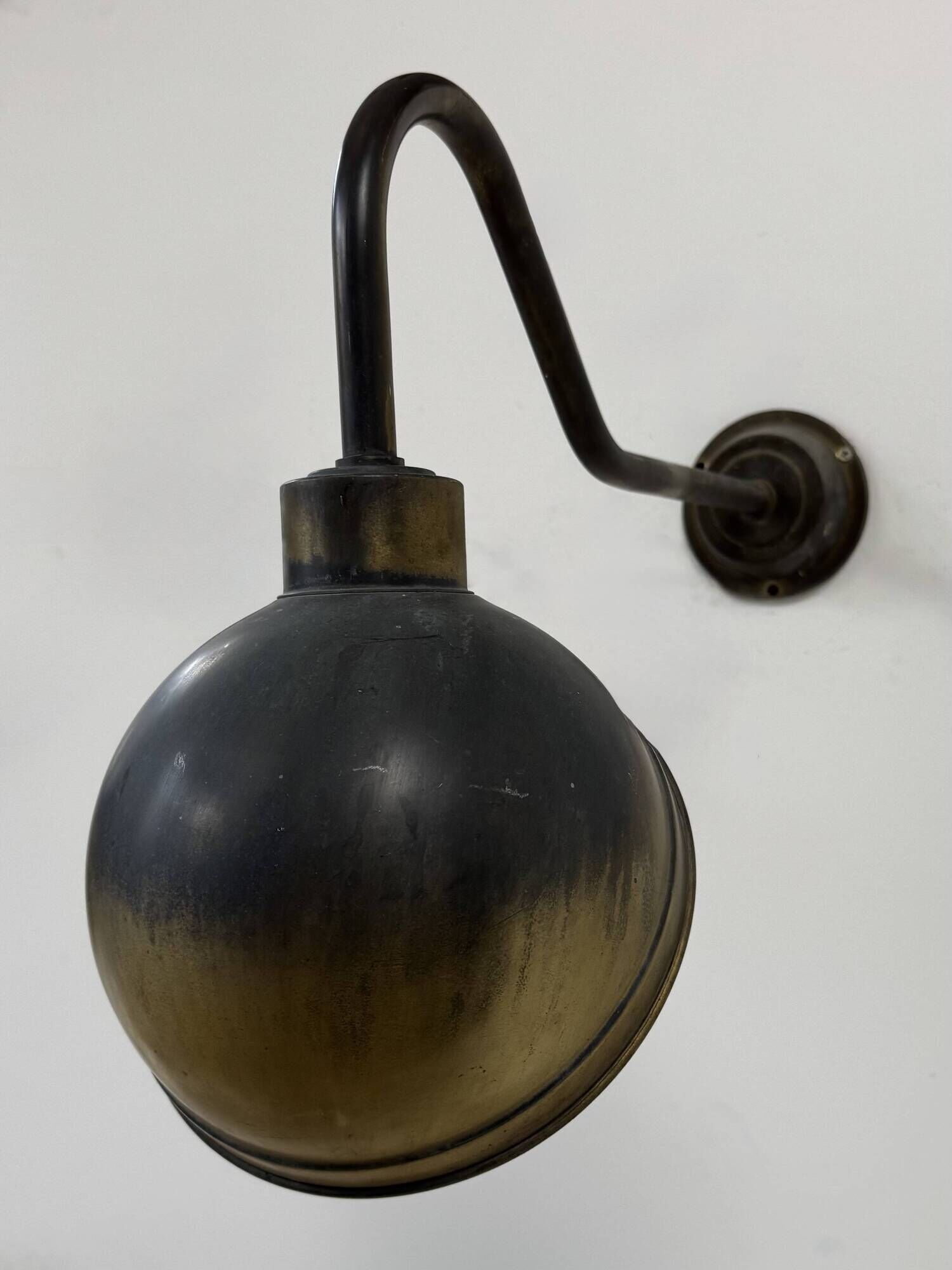 Pair of XL patinated brass wall lights, France, 1970.