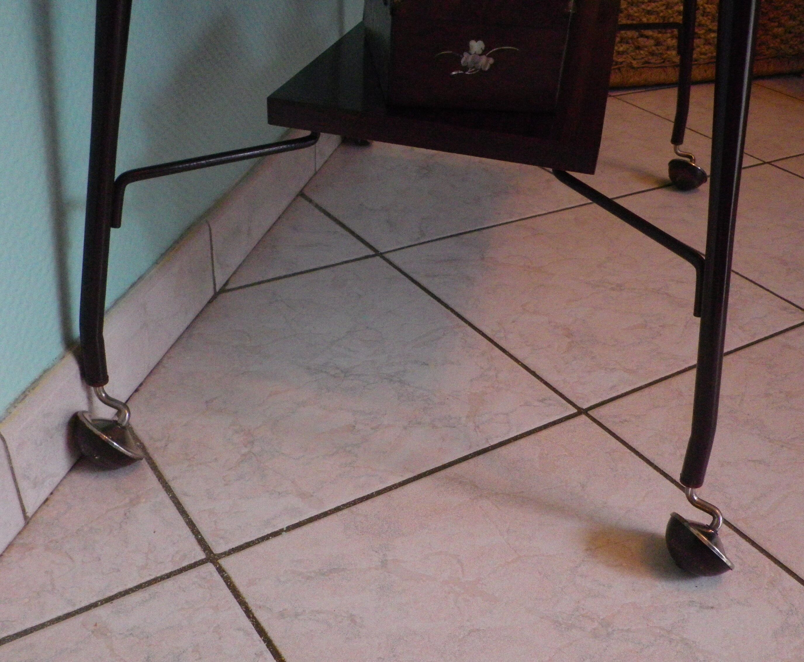 Formica TV cabinet, 2 trays, on atypical curved casters - 1960s