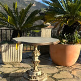 Carved and lacquered wooden side table.