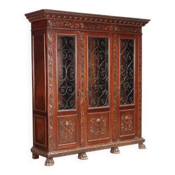 Old library in neo-Renaissance style made of walnut, 20th century.