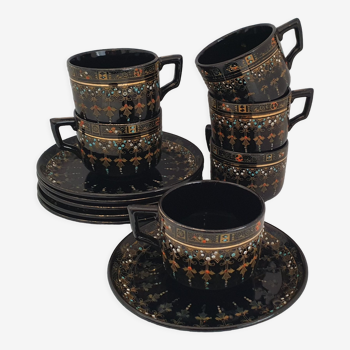 Six coffee cups and saucers in English earthenware Gibson & sons