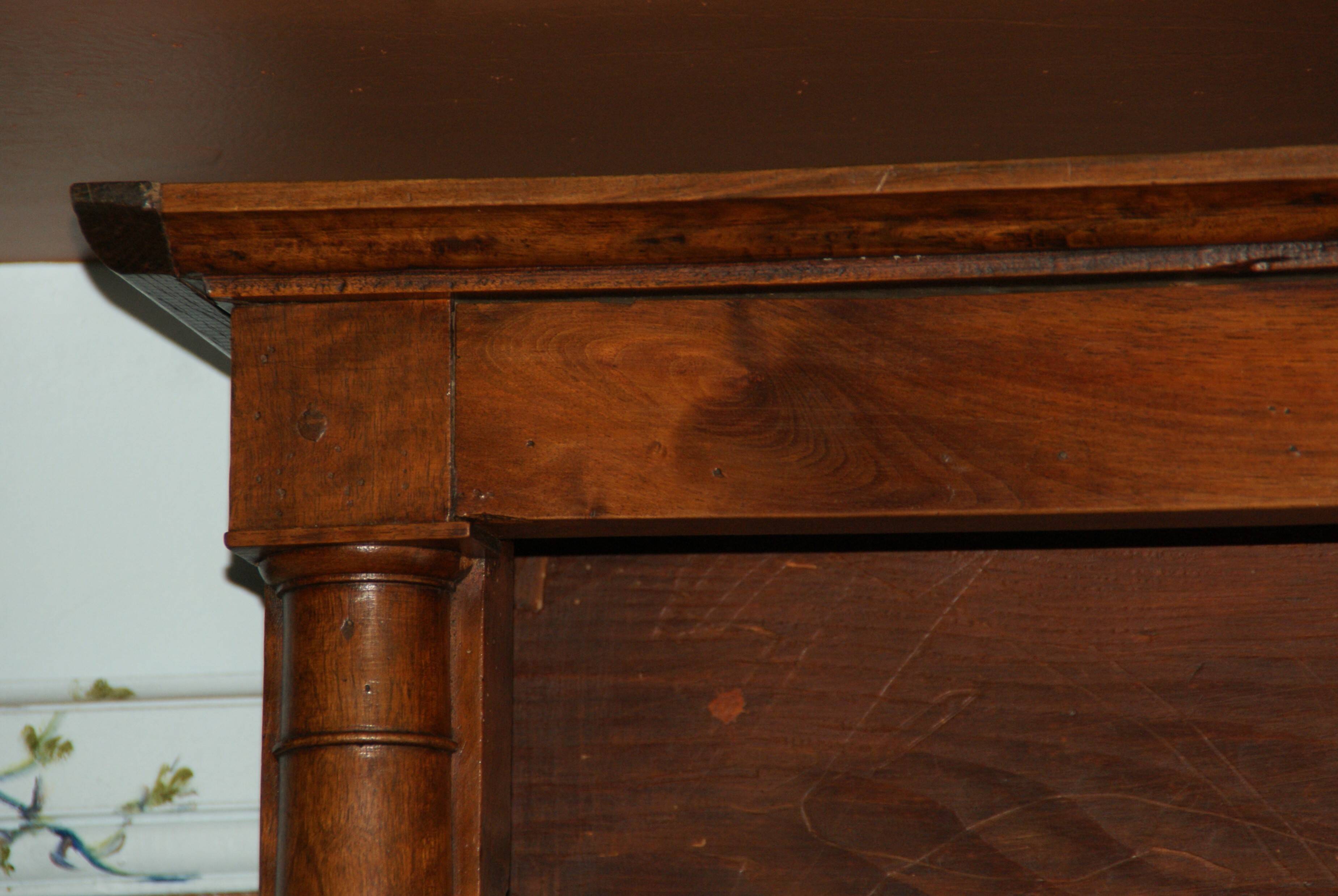Sideboard with half-columns in walnut, Empire period.