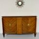 Antique art deco sideboard from the 1930s with veneered wood and bronze insert