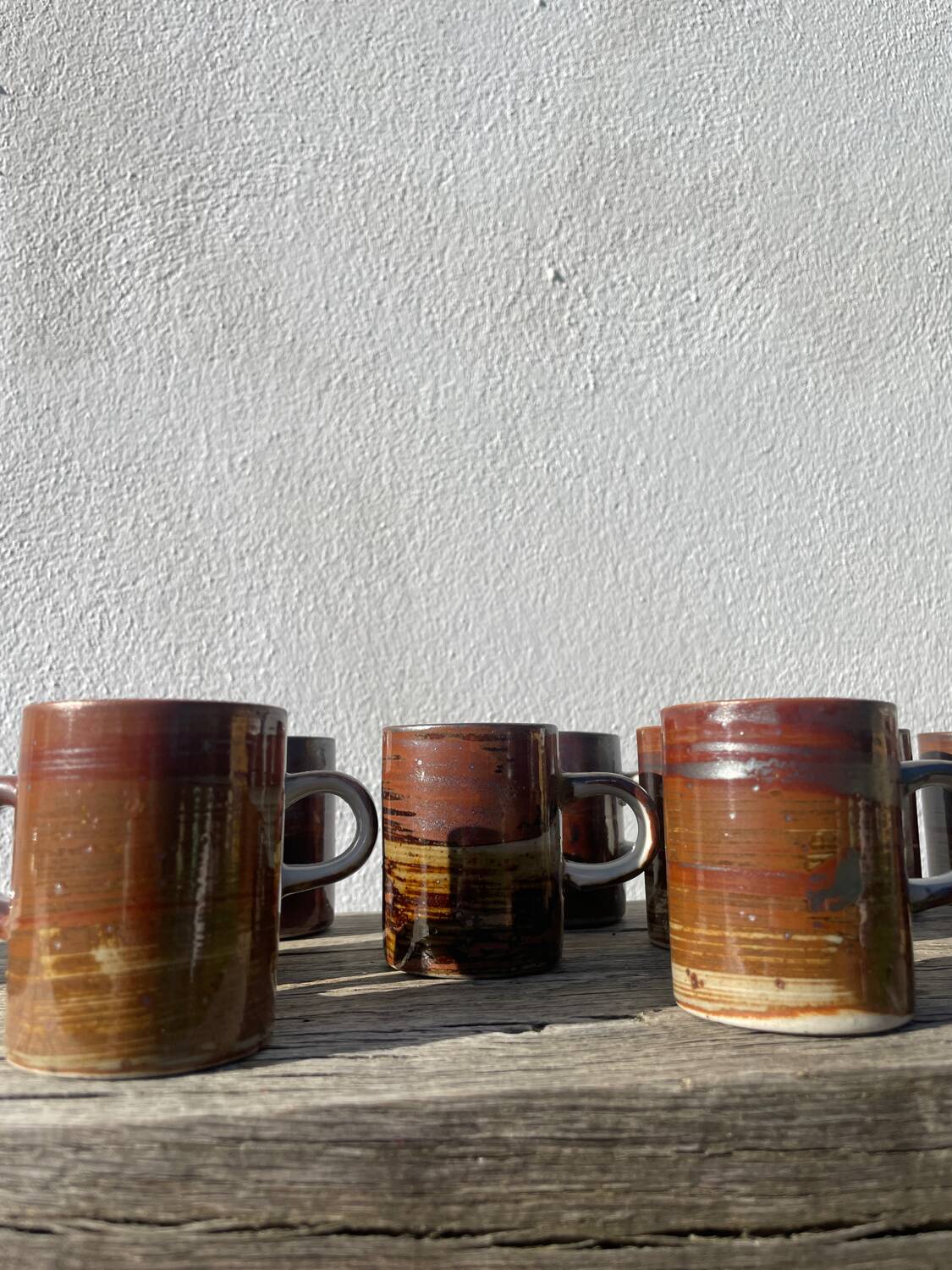10 unique ceramic/stoneware coffee cups