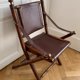 Set of three folding officer chairs wood and leather