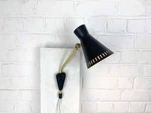 Scandinavian Diabolo wall light model 215 by EAE, Sweden, 1950s.