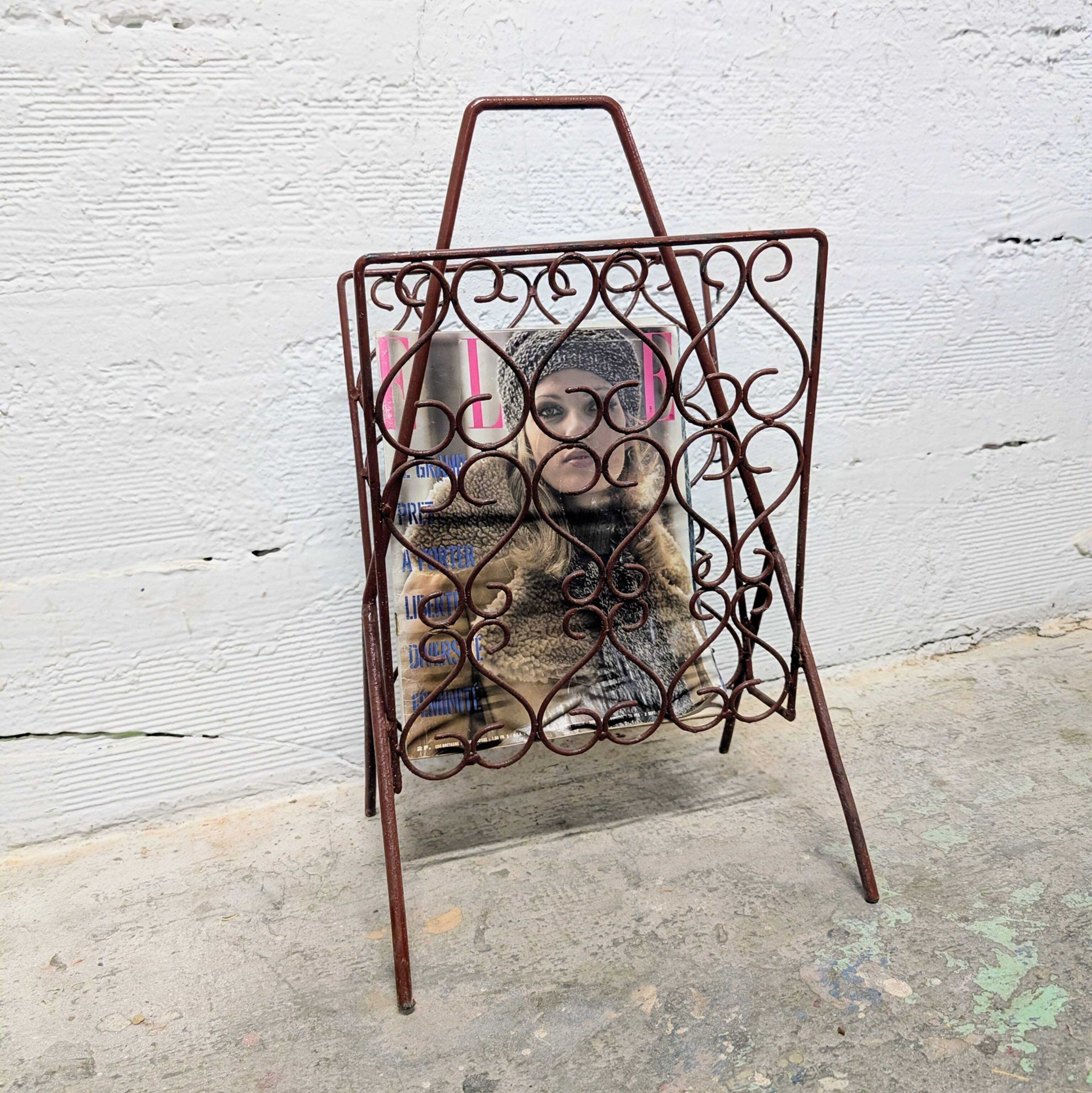 Vintage wrought iron magazine rack