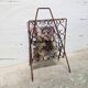 Vintage wrought iron magazine rack
