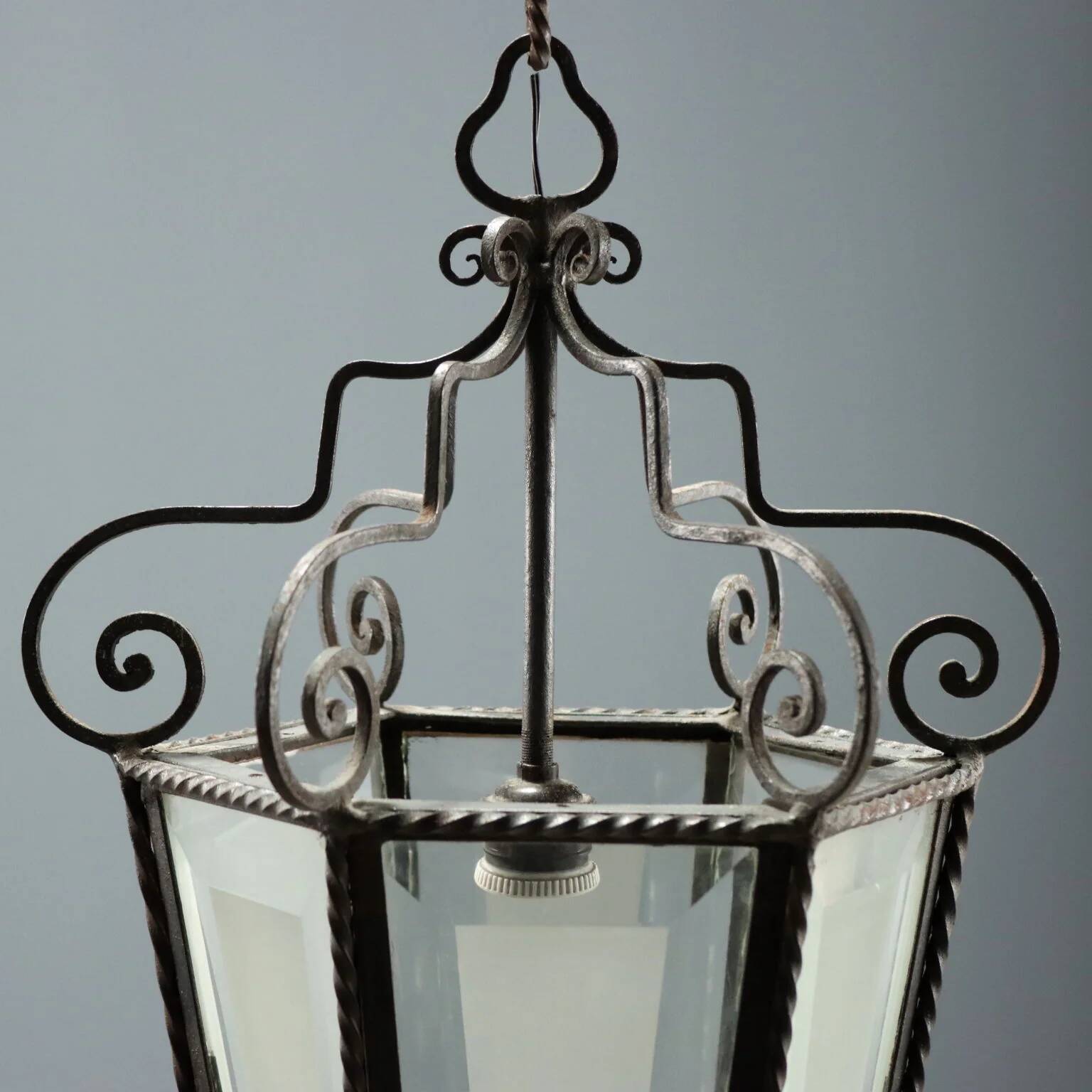 Old iron and glass lanterns, Italy, early 20th century.