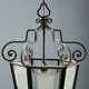 Old iron and glass lanterns, Italy, early 20th century.