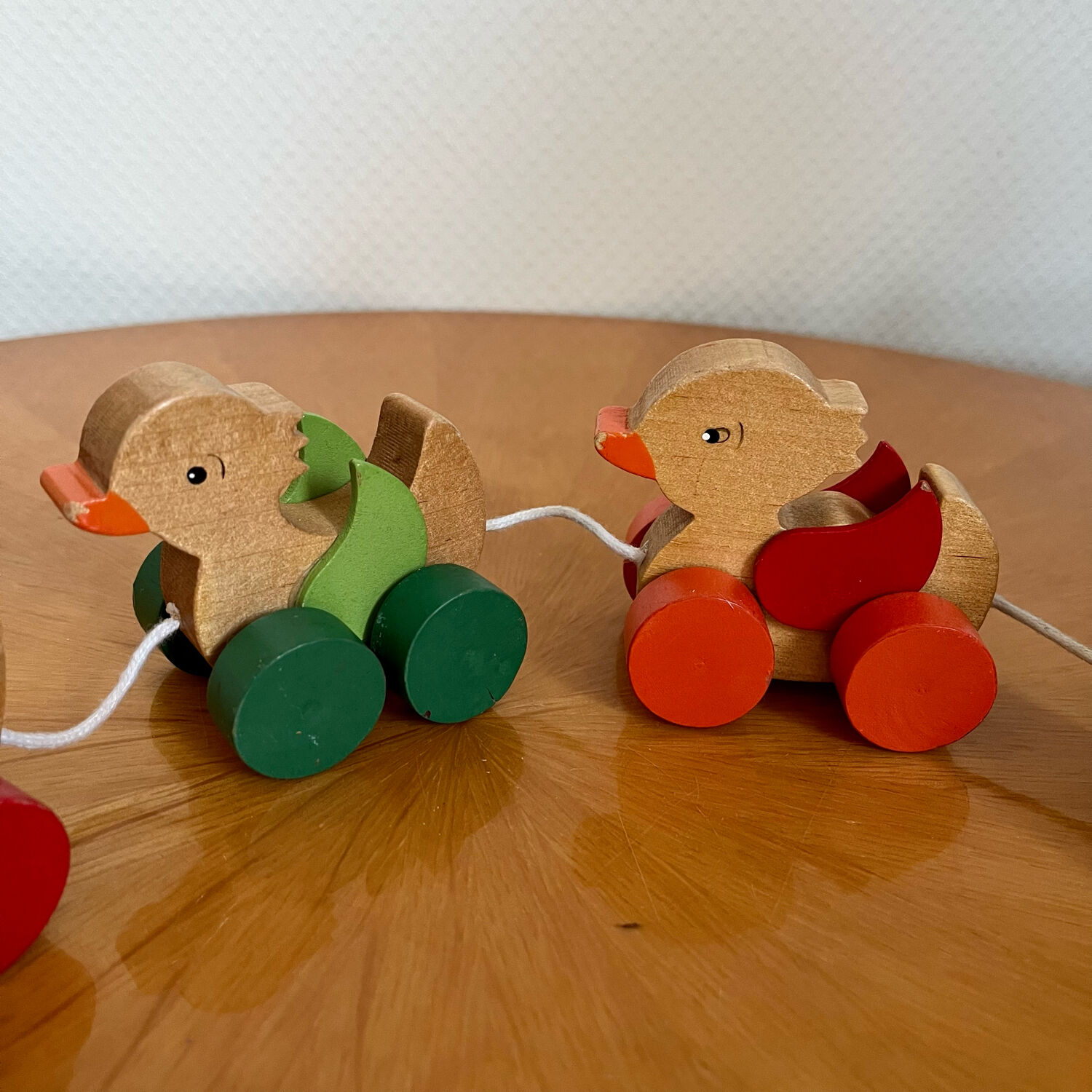 Old vintage wooden duck toy to pull