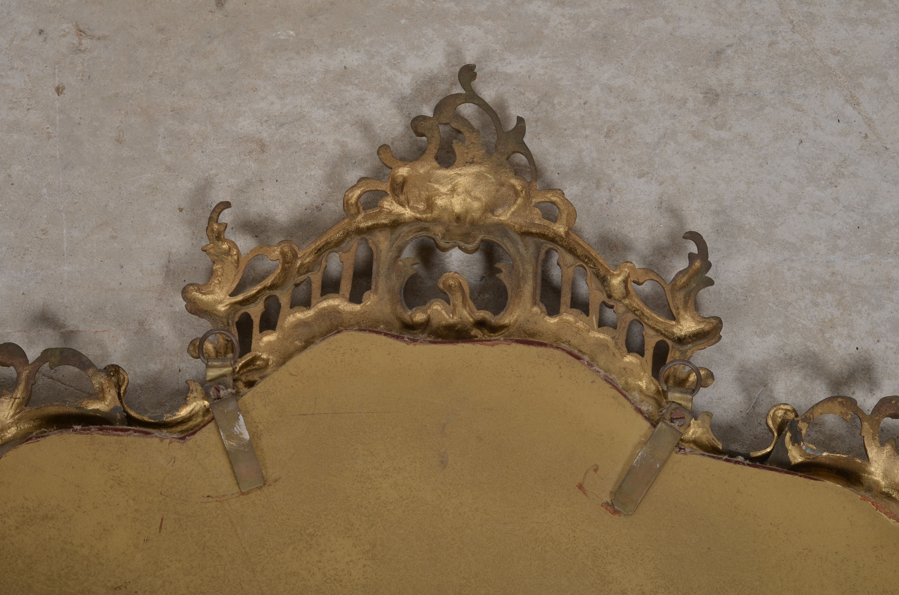 Mirror with baroque style parecloses in bronze 102 x 61 cm