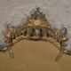 Mirror with baroque style parecloses in bronze 102 x 61 cm
