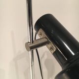 Adjustable lamp in black lacquered metal and chrome. French work. Circa 1970.