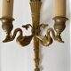 Pair of double brass wall sconces in the Louis XVI style, decorated with swans